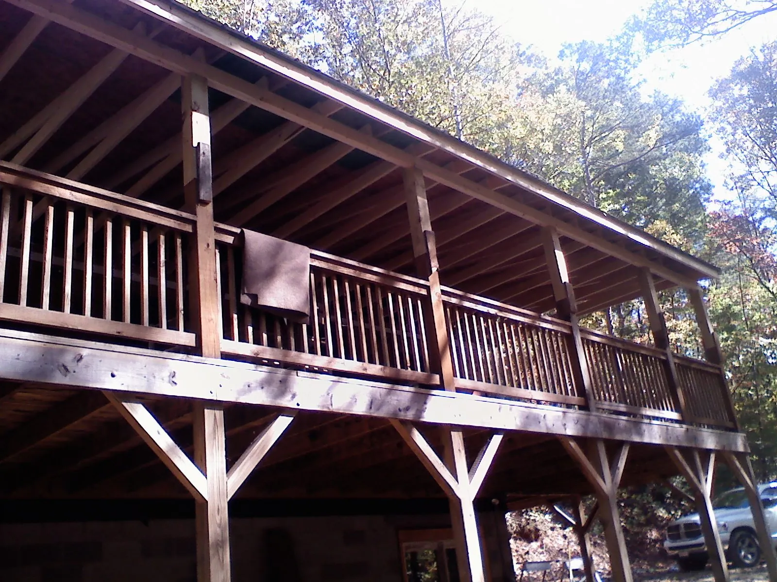 Timber framing under a new elevated porch and deck — Roof Leak Repair in Acushnet by Roofing Brothers